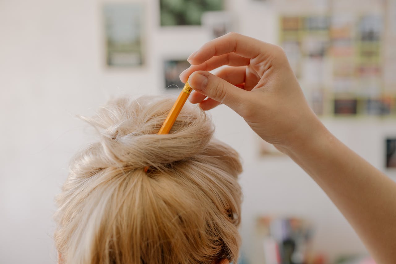 Low Bun with Center Part 