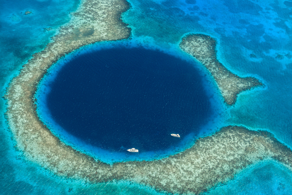 The Great Blue Hole is a giant marine sinkhole off the coast of Belize