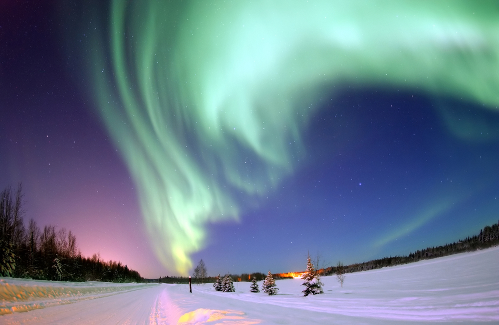 The Northern Lights are a result of solar particles colliding with the Earth’s atmosphere