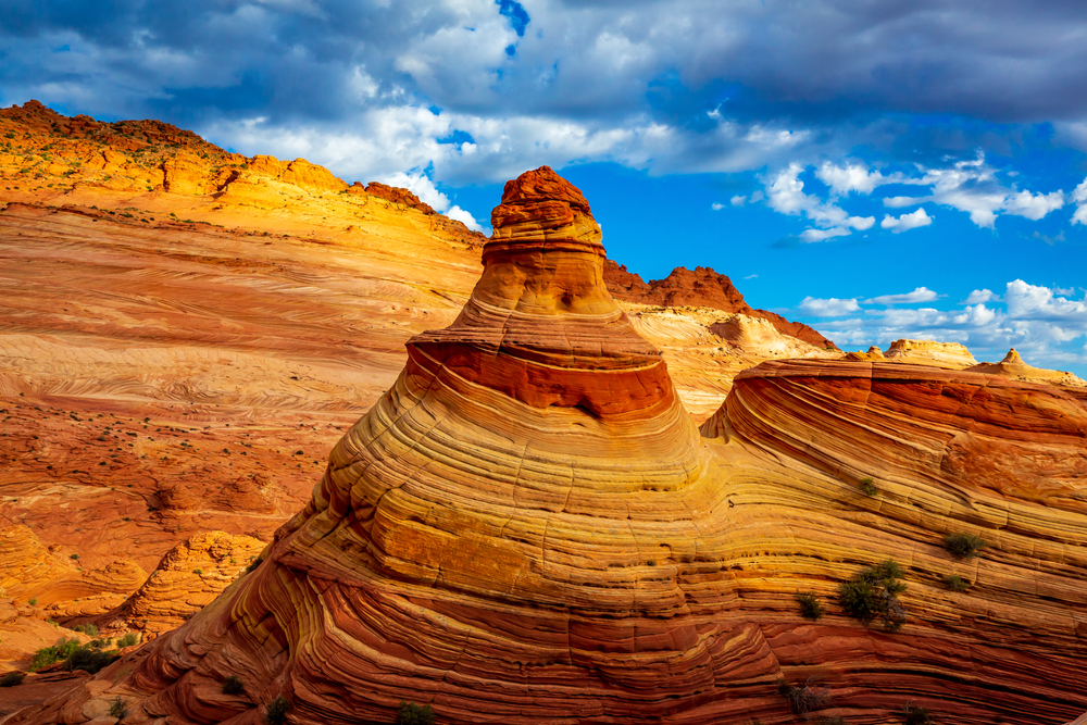 The Wave is a sandstone rock formation in Arizona known for its colorful, undulating forms