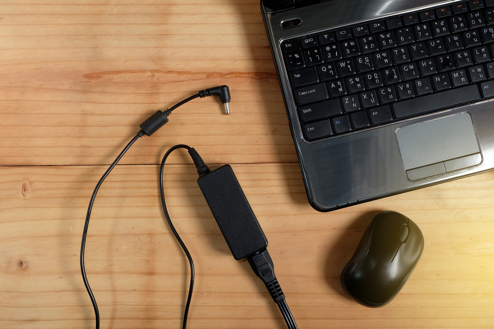 Cylinder on Laptop Charger Cables